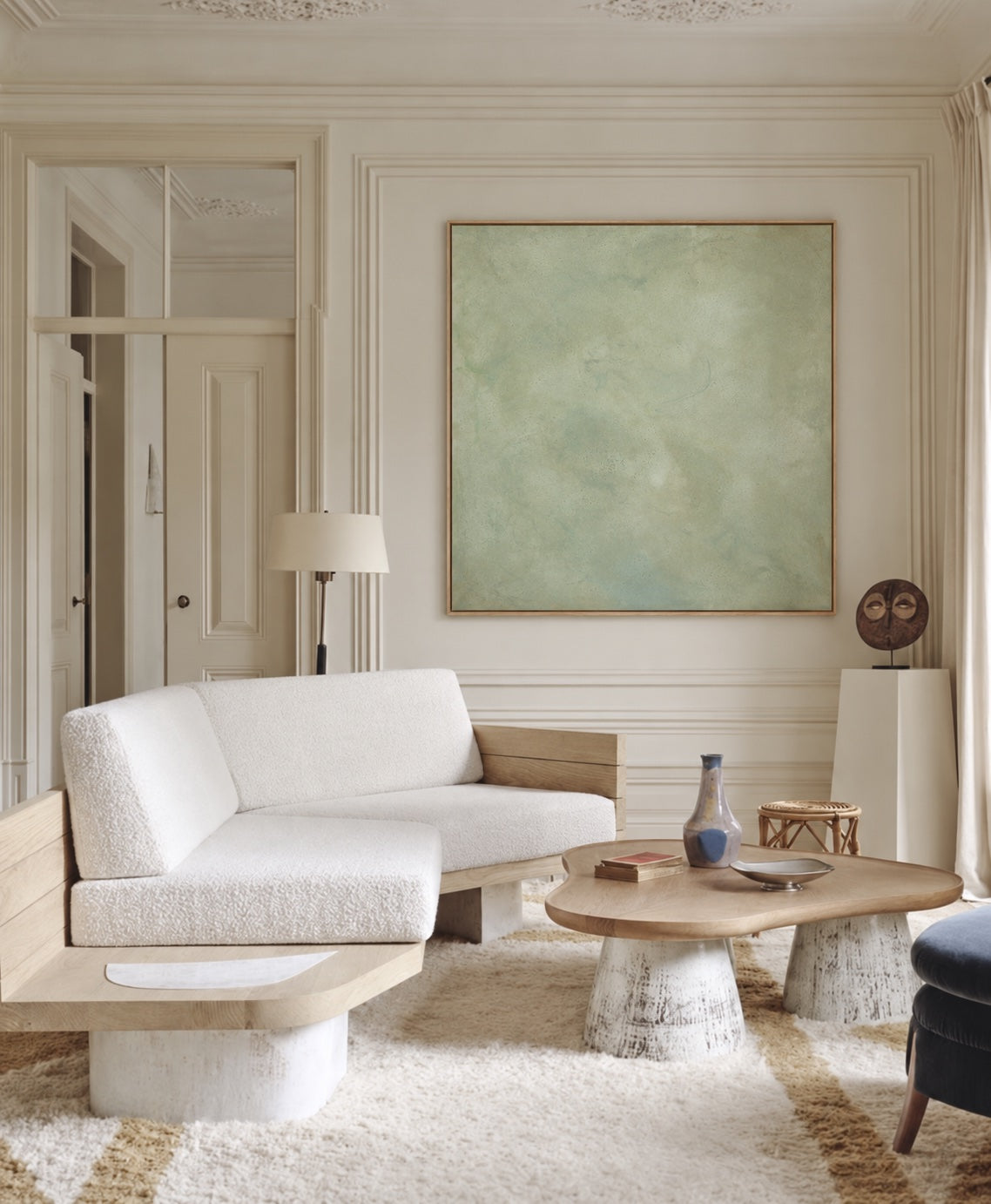 Moss above a white boucle sofa
