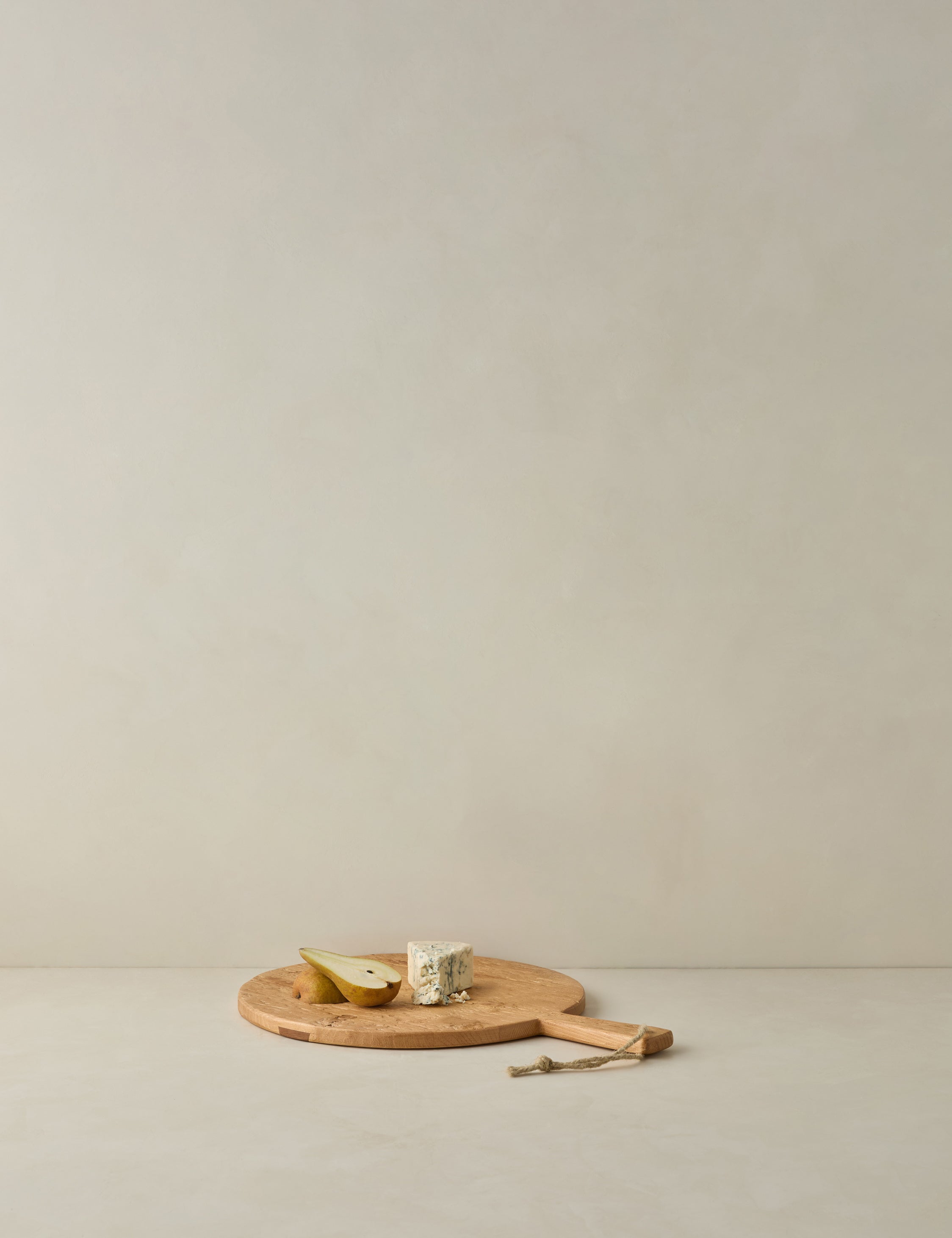 Lulu and Georgia - Handcrafted Round Pine Serving Board by etúHOME