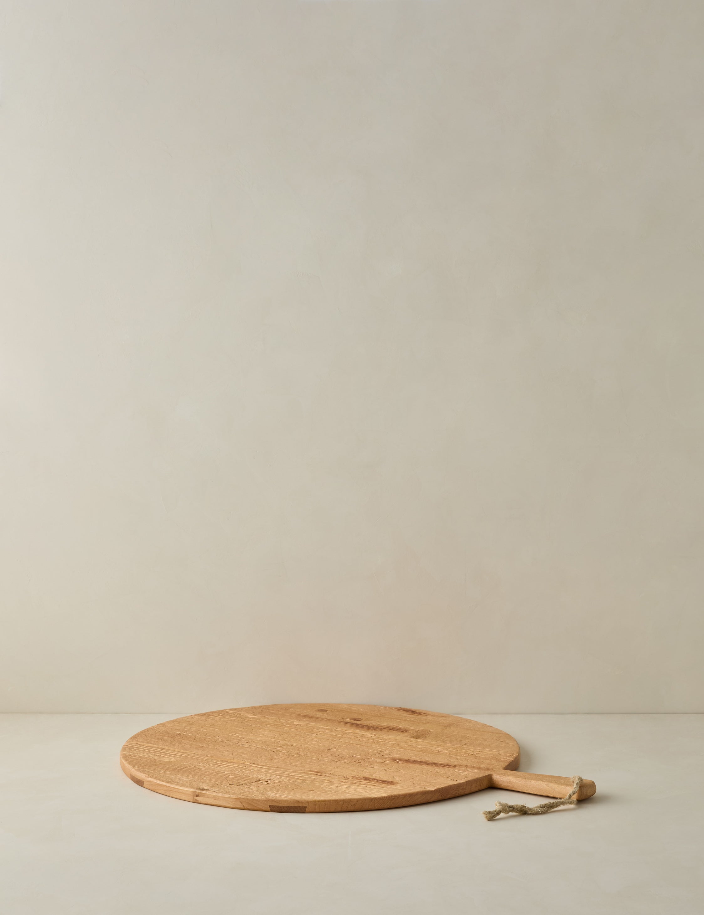 Lulu and Georgia - Handcrafted Round Pine Serving Board by etúHOME