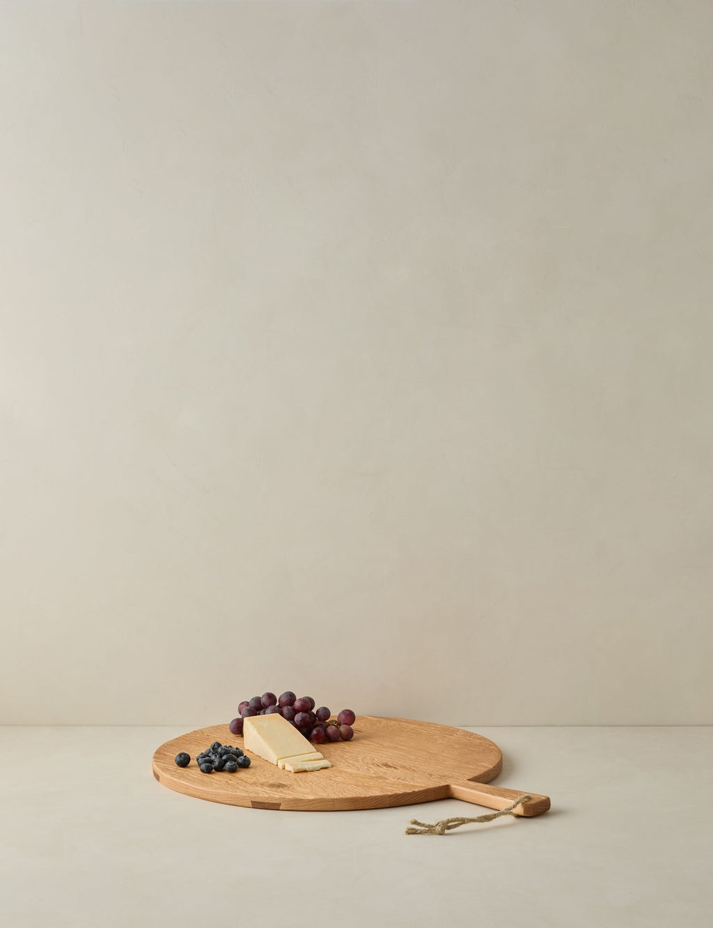 Lulu and Georgia - Handcrafted Round Pine Serving Board by etúHOME
