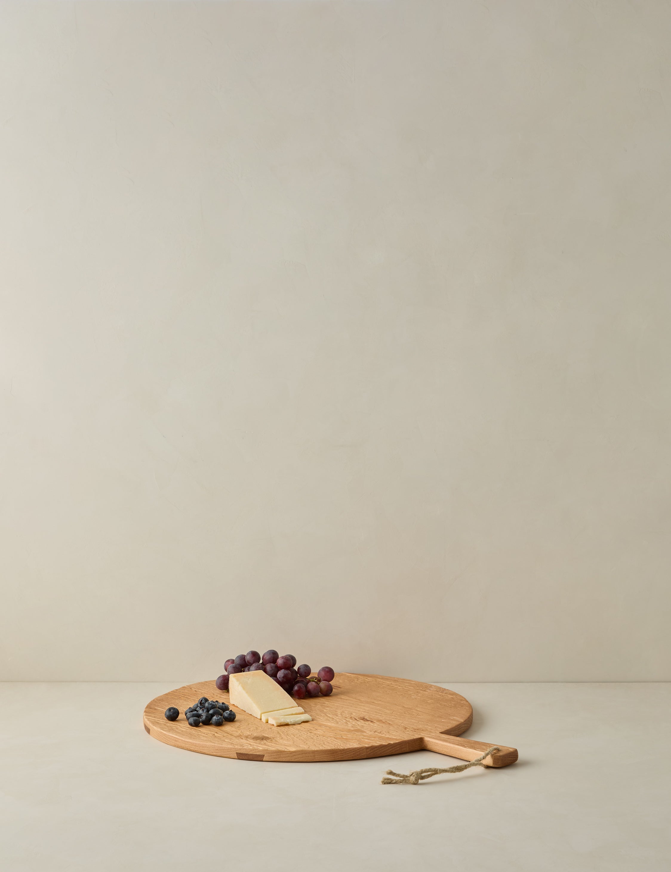 Lulu and Georgia - Handcrafted Round Pine Serving Board by etúHOME