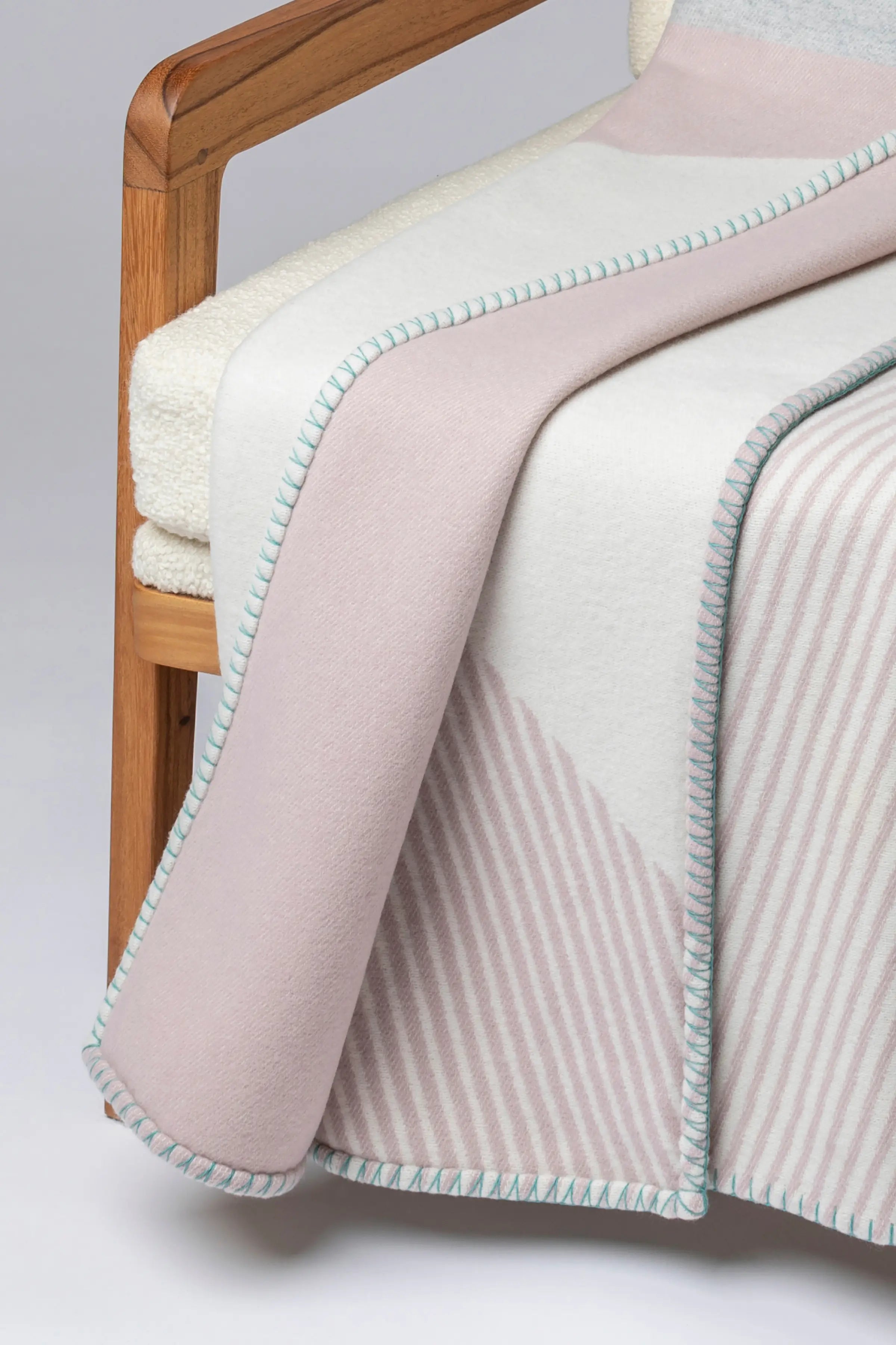 Johnstons of Elgin - Blanket Stitched Geometric Throw in Playful Pastel