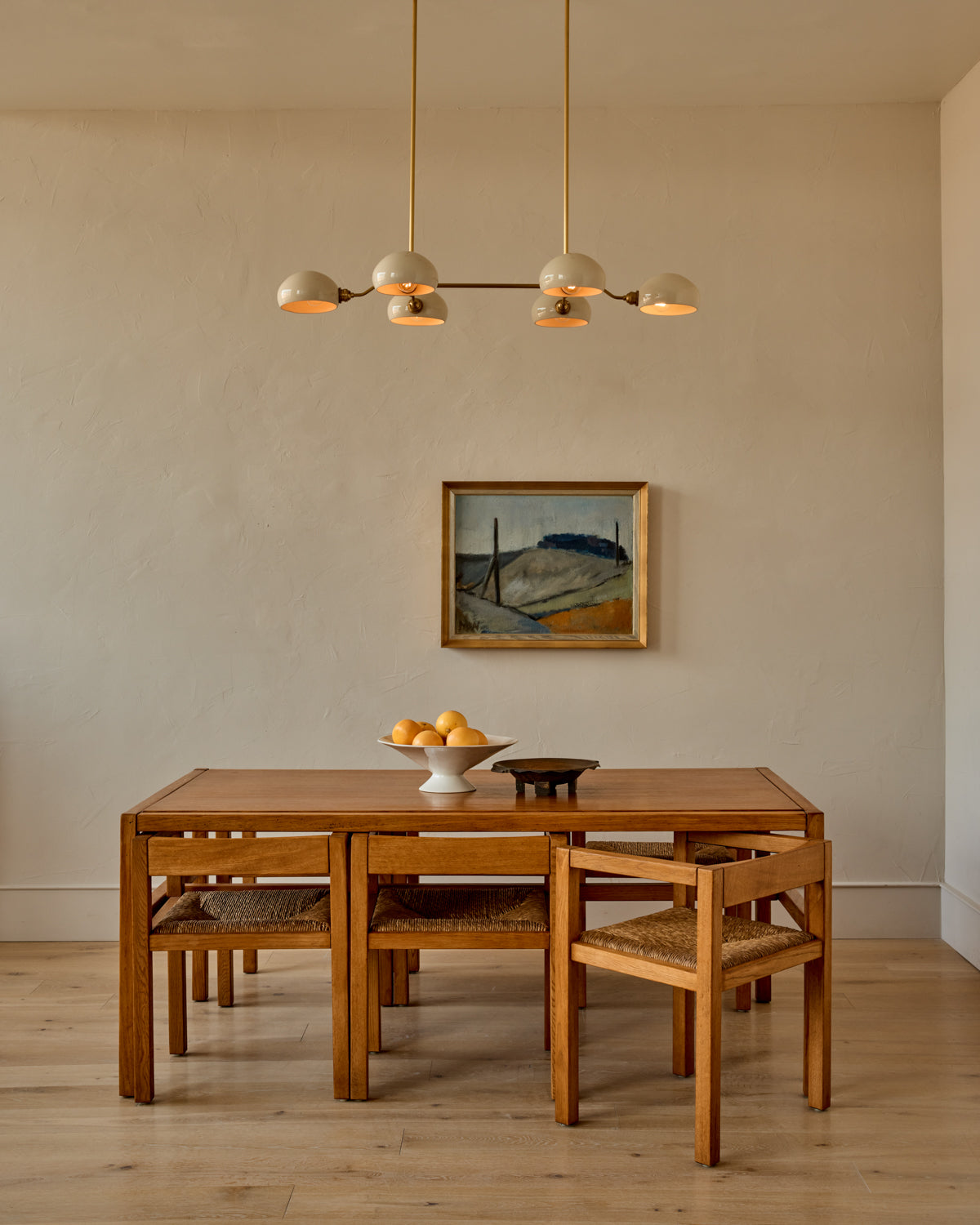 Lostine - Nested Oak Dining Suite