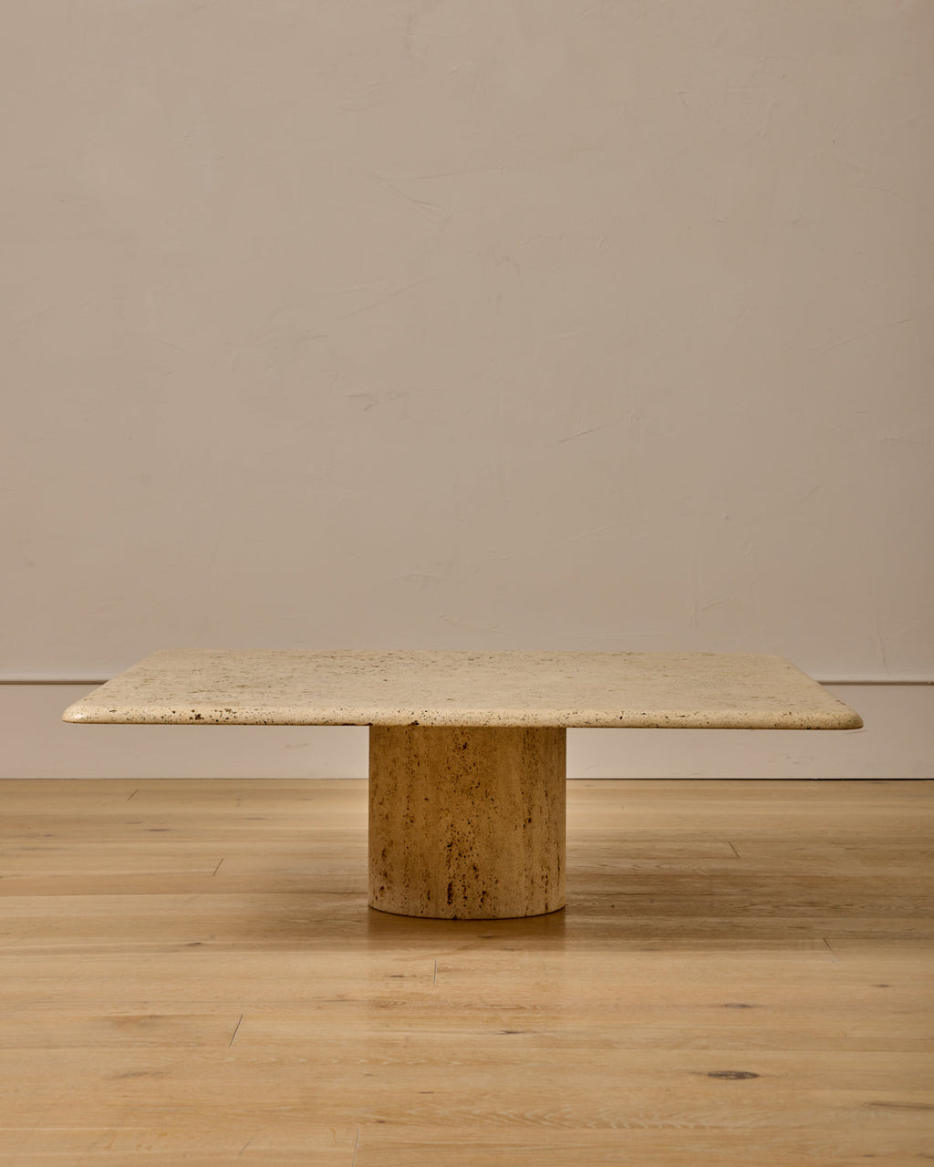 Lostine - Mid - Century Column - Base Travertine Coffee Table