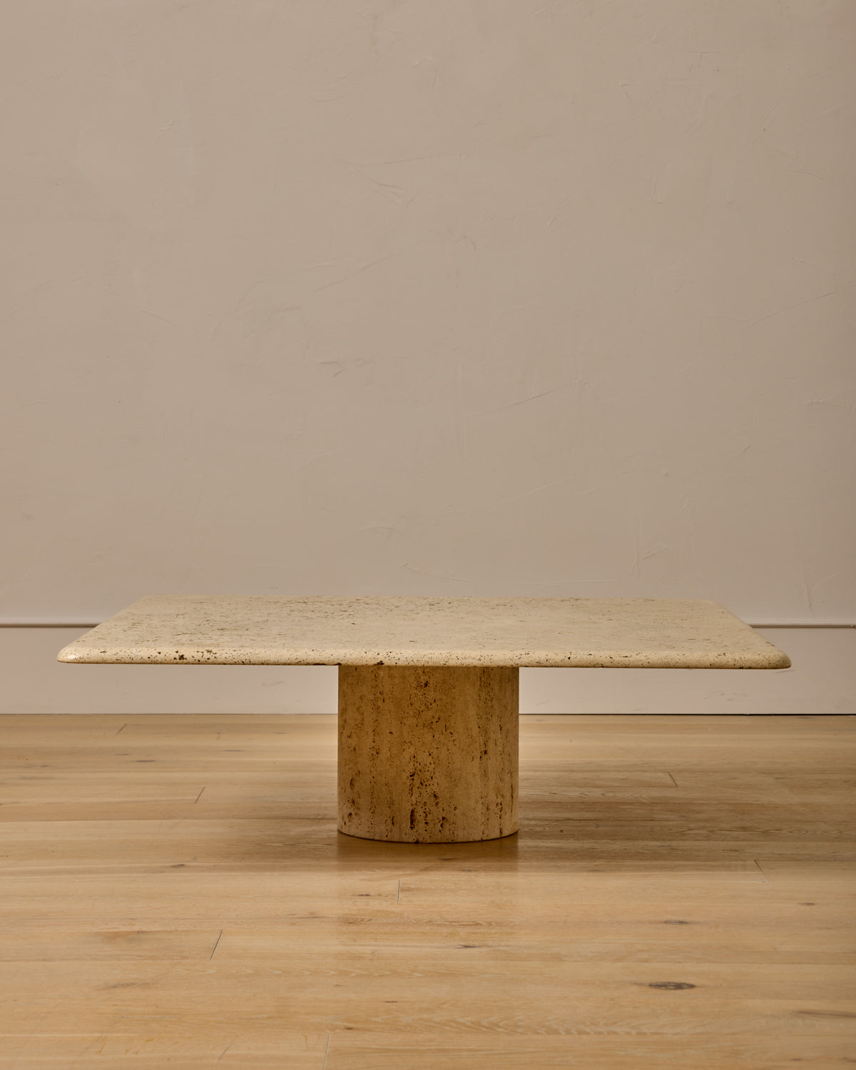Lostine - Mid - Century Column - Base Travertine Coffee Table