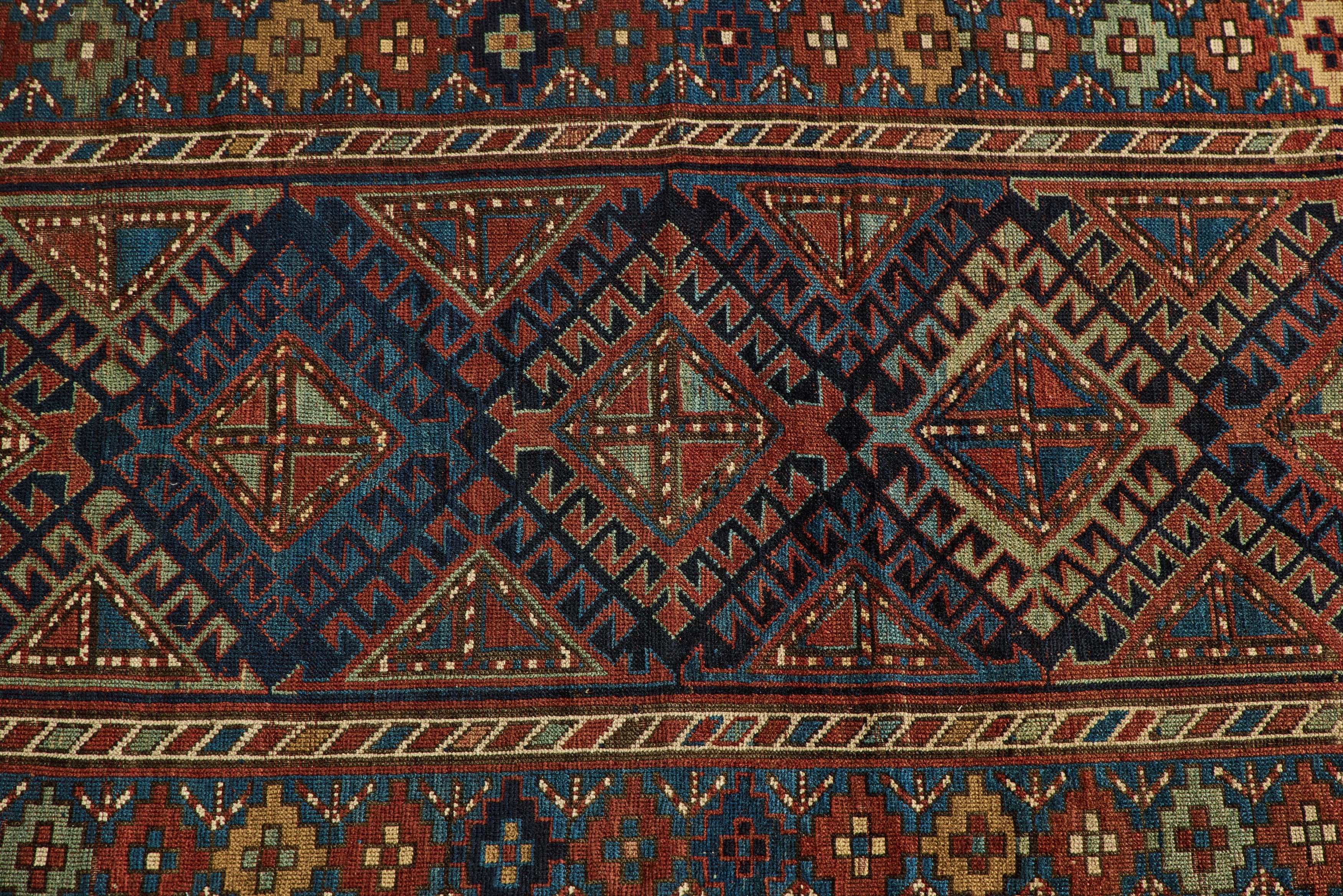 Nicky Kehoe - Blue & Red Kazak Rug 4'8 X 8'2