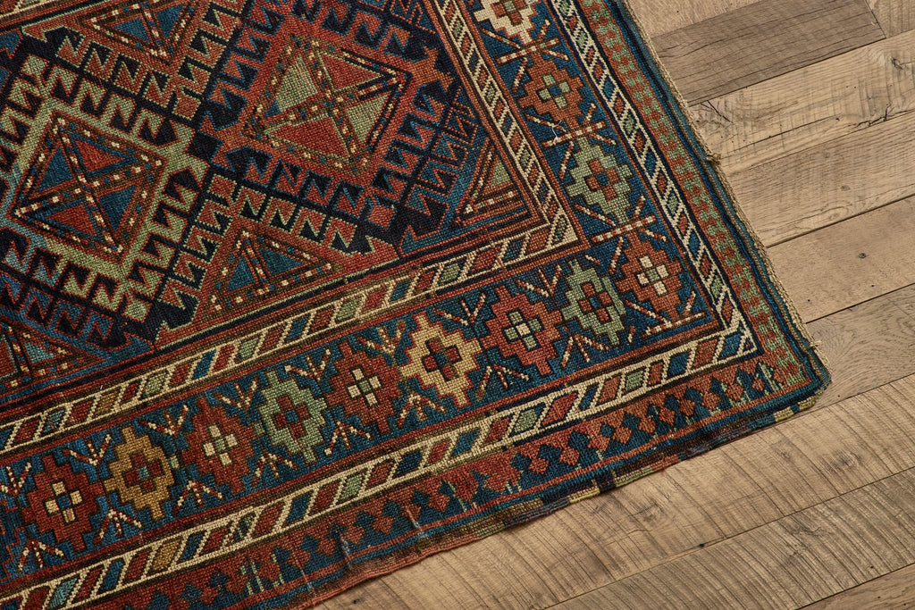 Nicky Kehoe - Blue & Red Kazak Rug 4'8 X 8'2