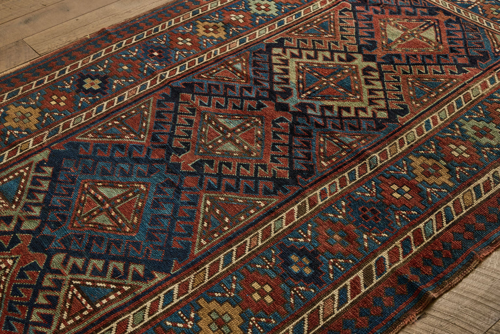 Nicky Kehoe - Blue & Red Kazak Rug 4'8 X 8'2