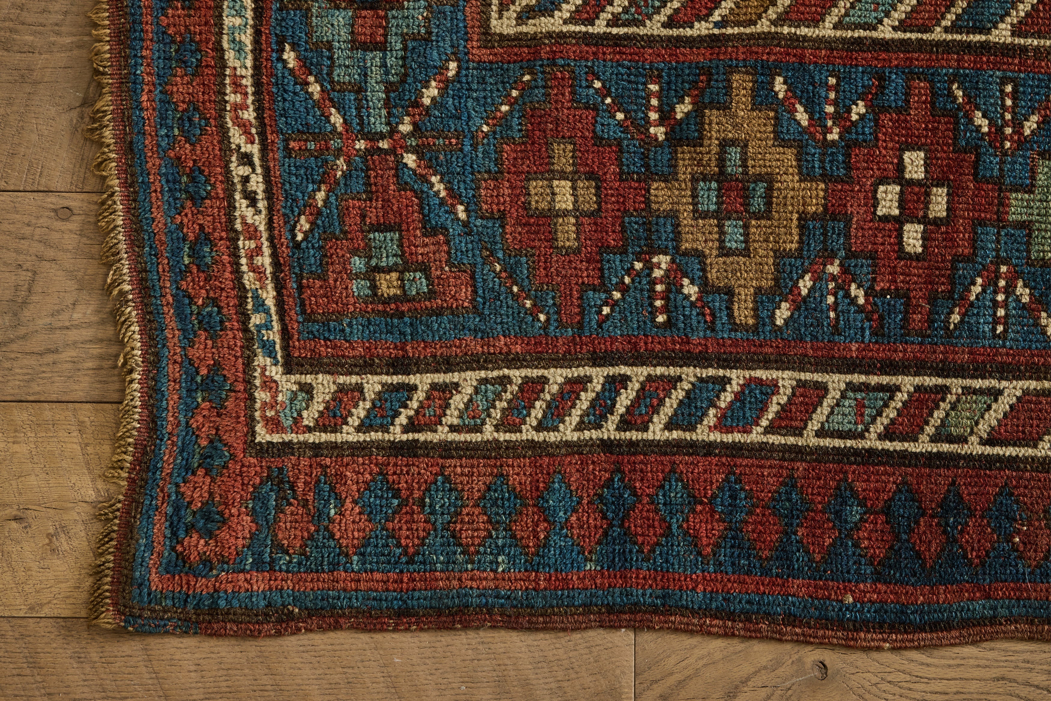 Nicky Kehoe - Blue & Red Kazak Rug 4'8 X 8'2