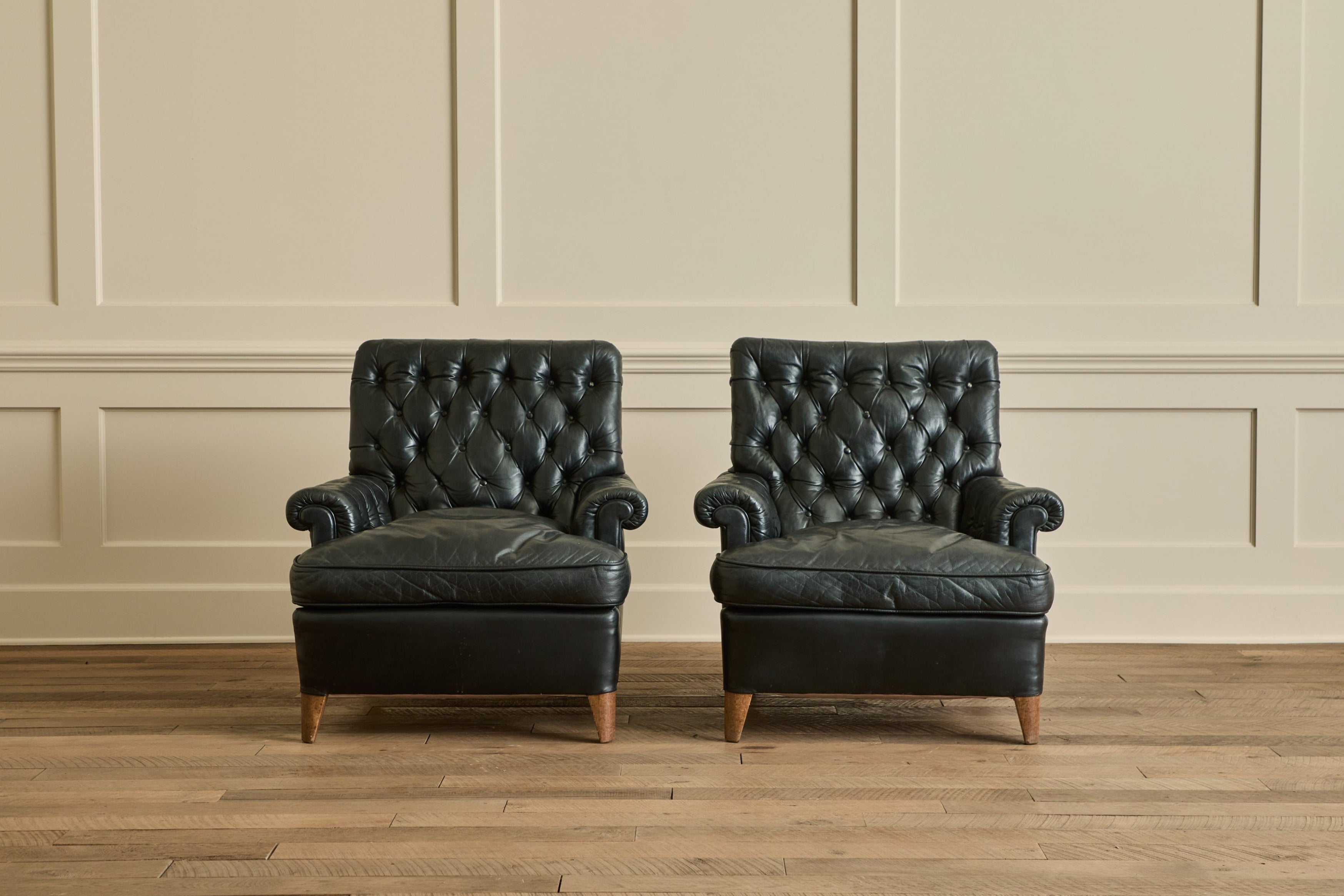 Nicky Kehoe - Pair of Tufted Black Leather Chairs