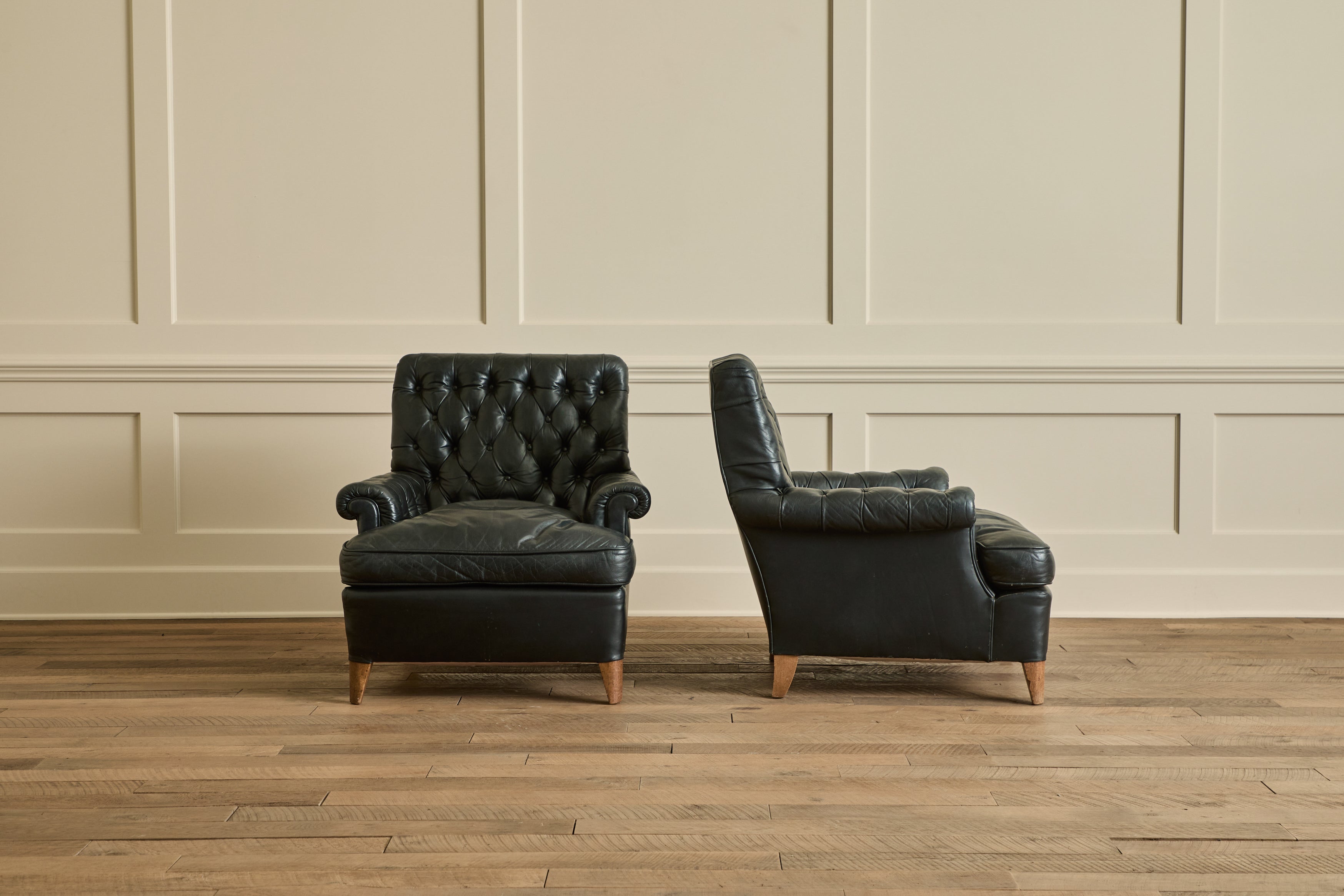 Nicky Kehoe - Pair of Tufted Black Leather Chairs