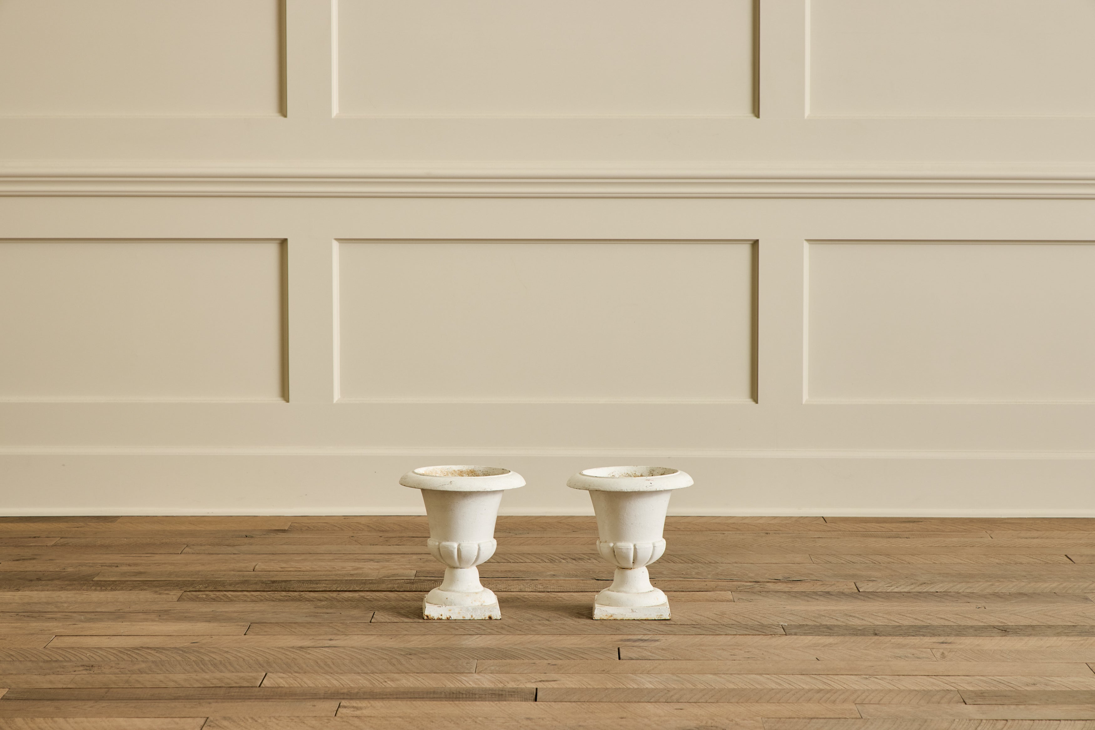 Nicky Kehoe - Pair of White Iron Garden Urns