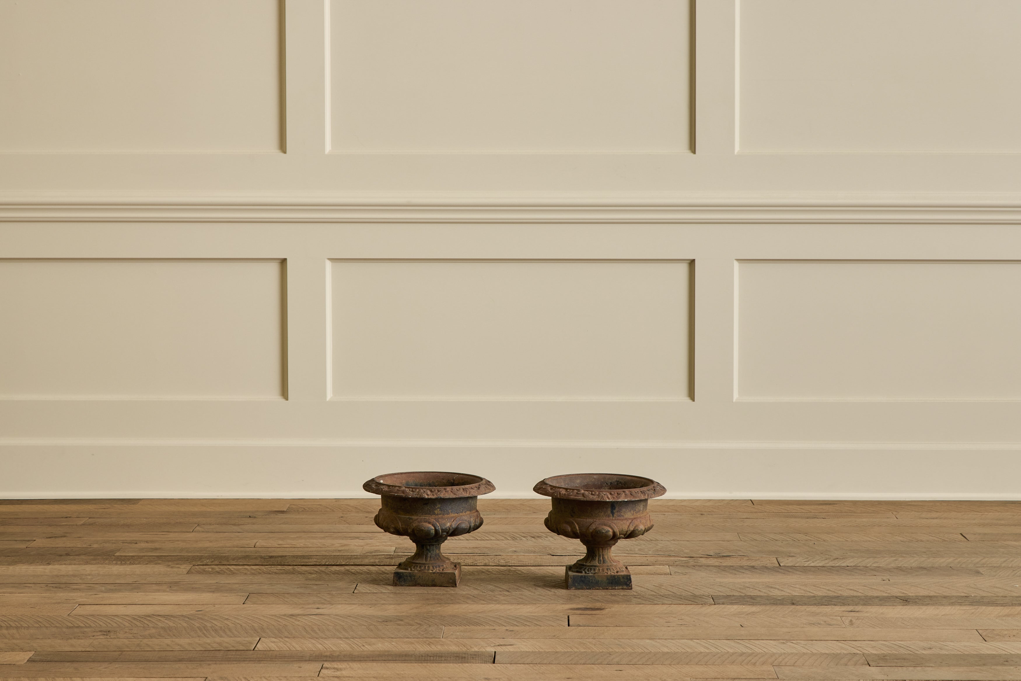 Nicky Kehoe - Pair of Brown Iron Garden Urns