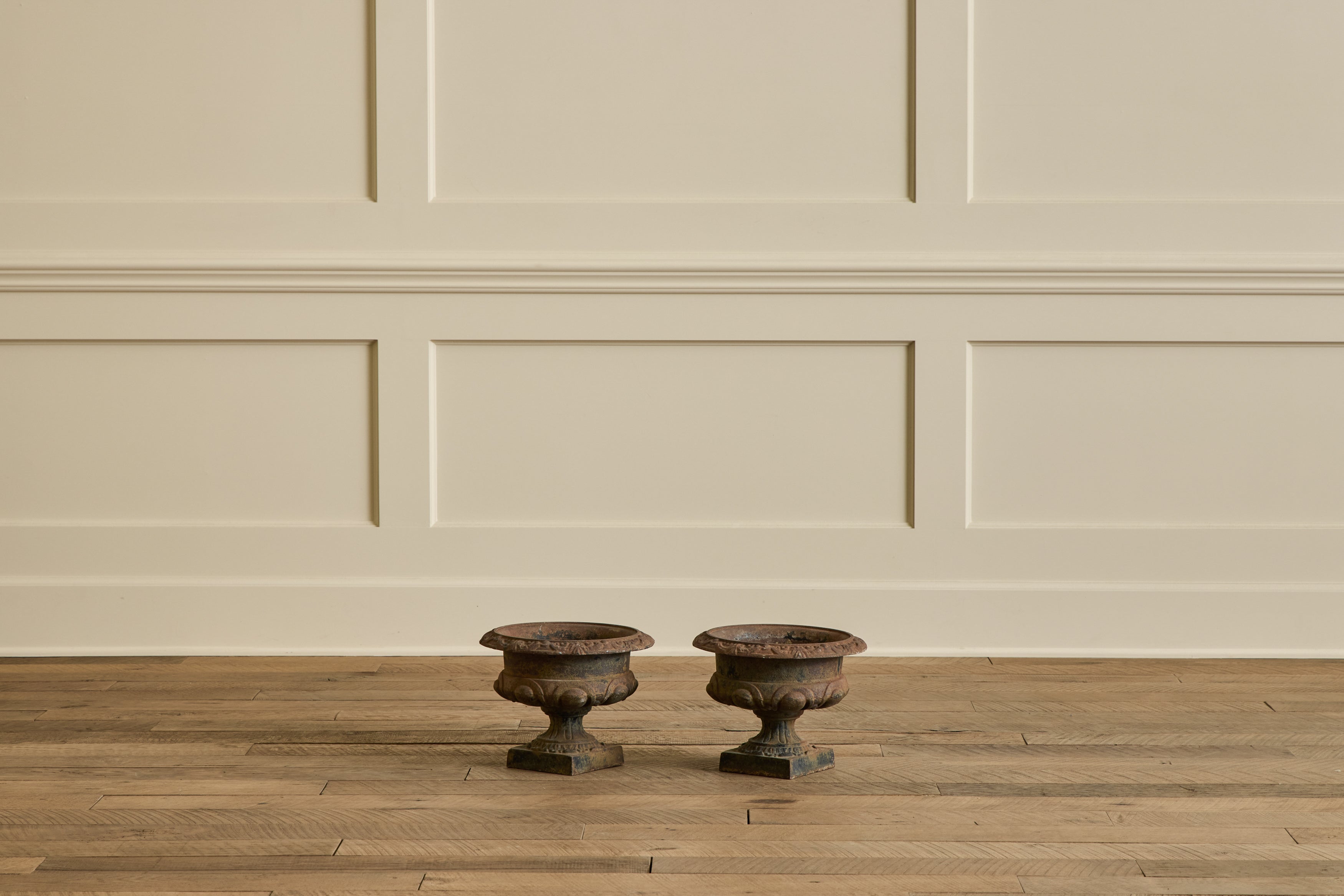 Nicky Kehoe - Pair of Brown Iron Garden Urns