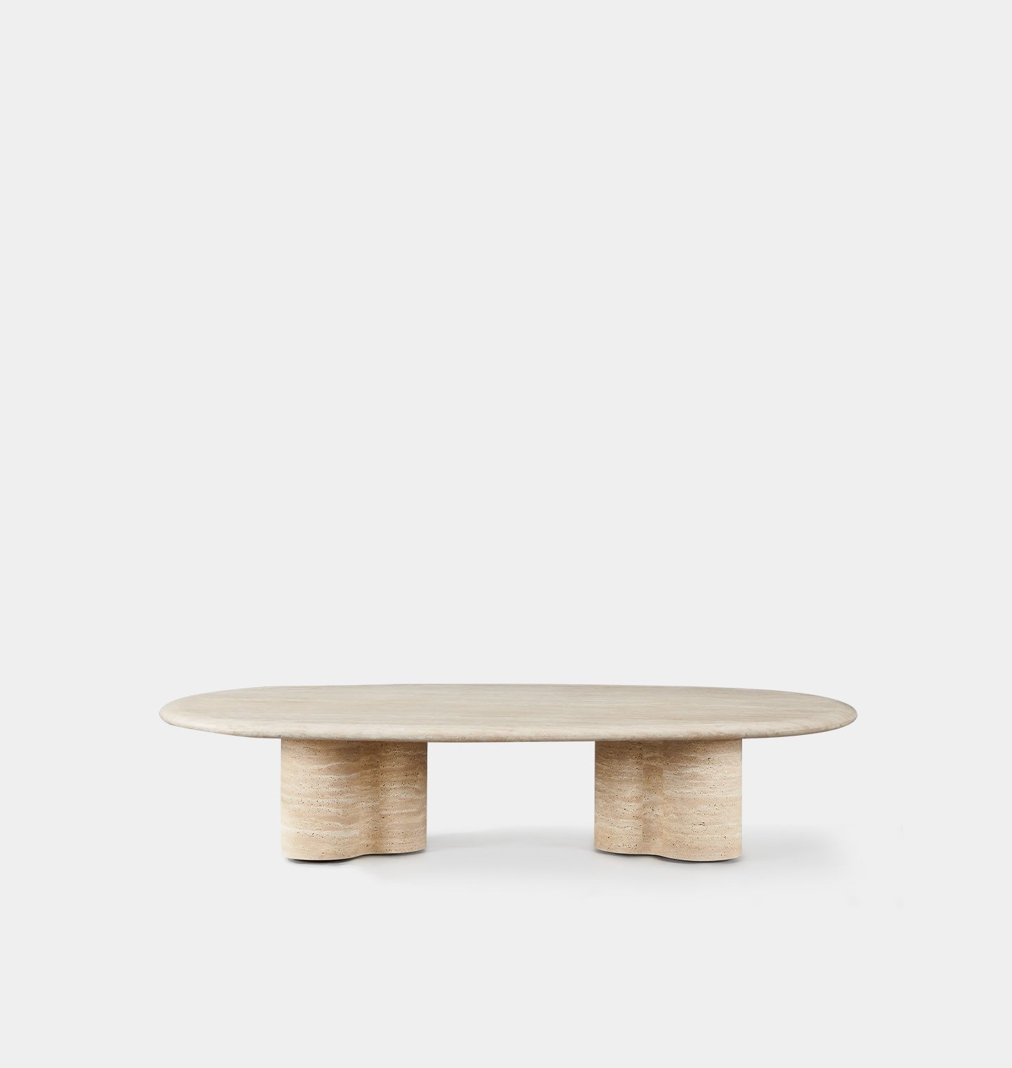 Amber Interiors - Porto Outdoor Travertine Pill Coffee Table