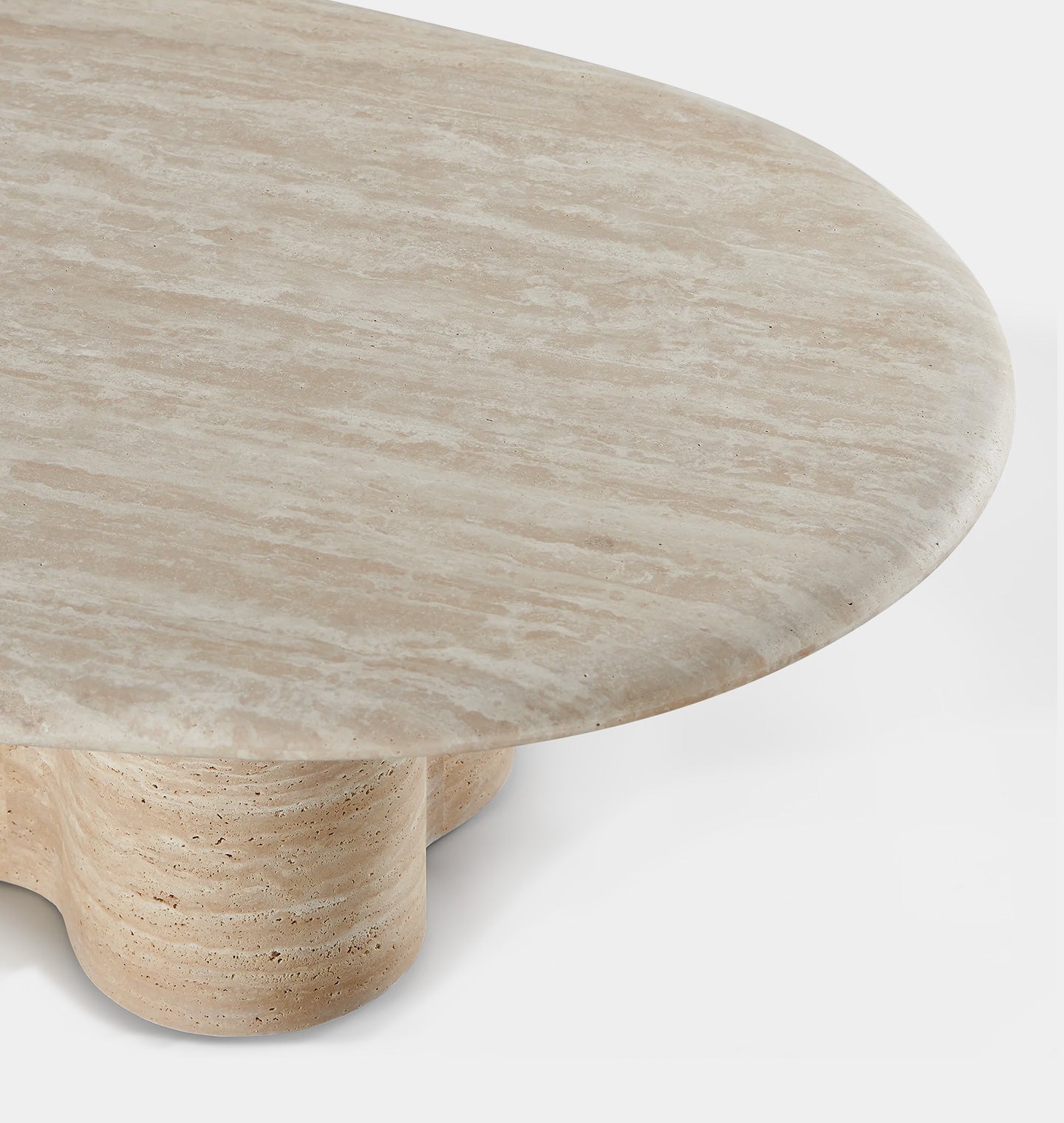 Amber Interiors - Porto Outdoor Travertine Pill Coffee Table