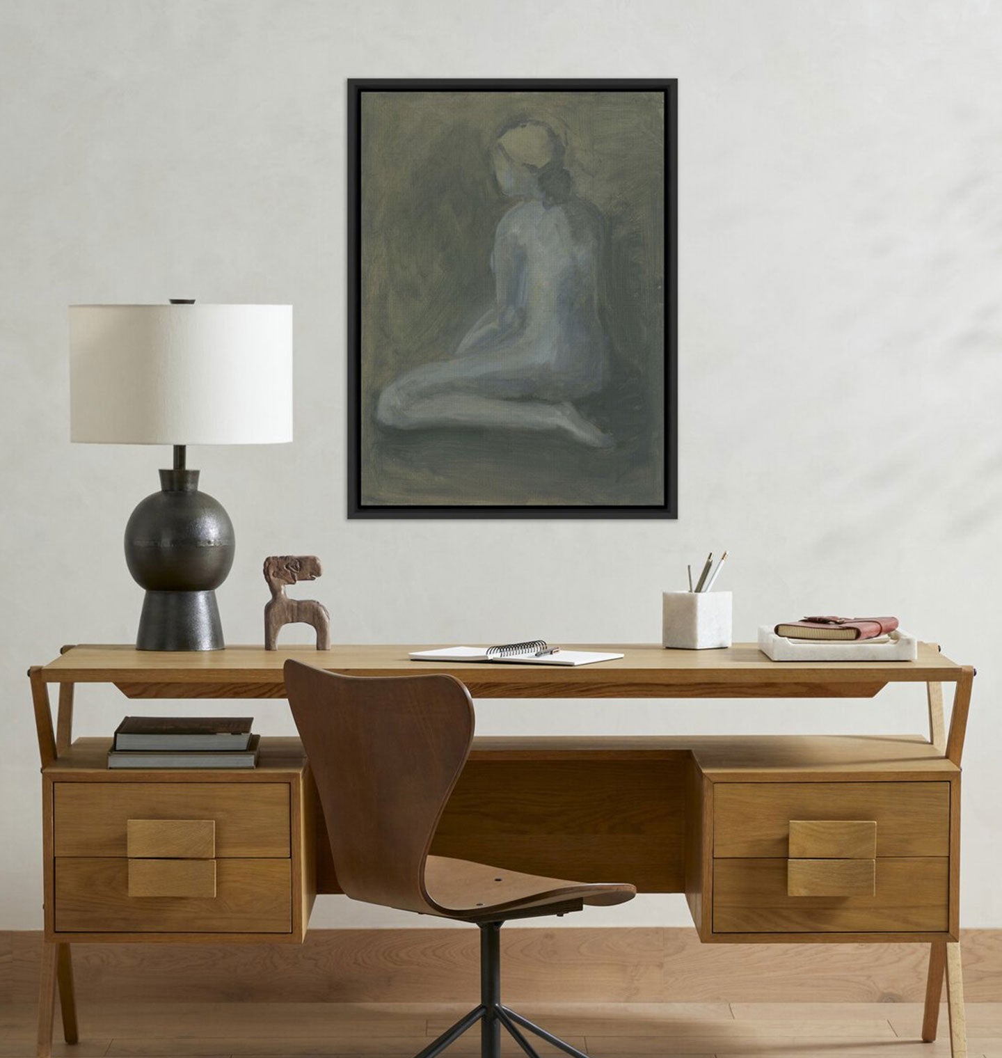 Amber Interiors - Seated Woman Framed Print