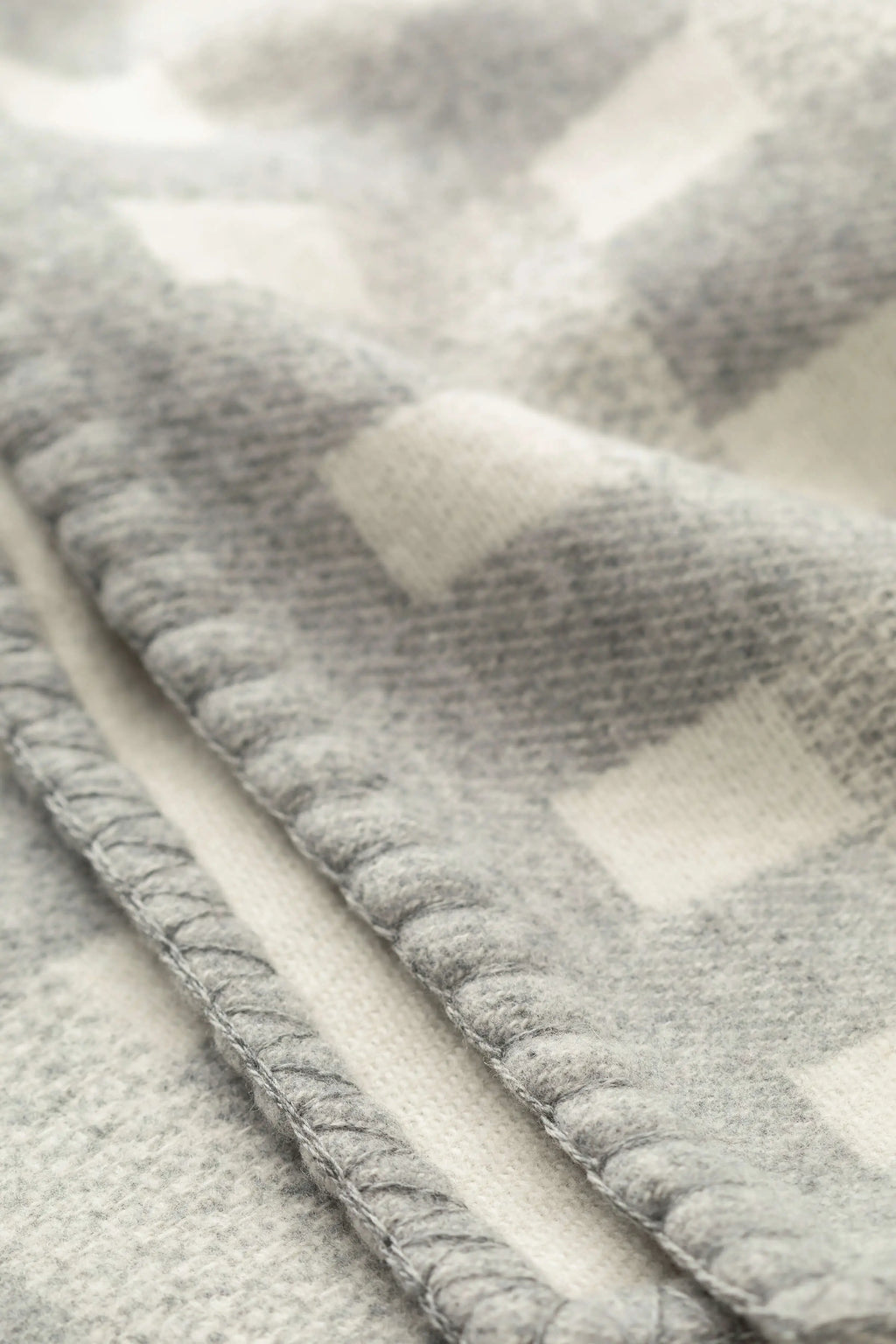 Johnstons of Elgin - Blanket Stitched Basketweave Throw in Light Grey