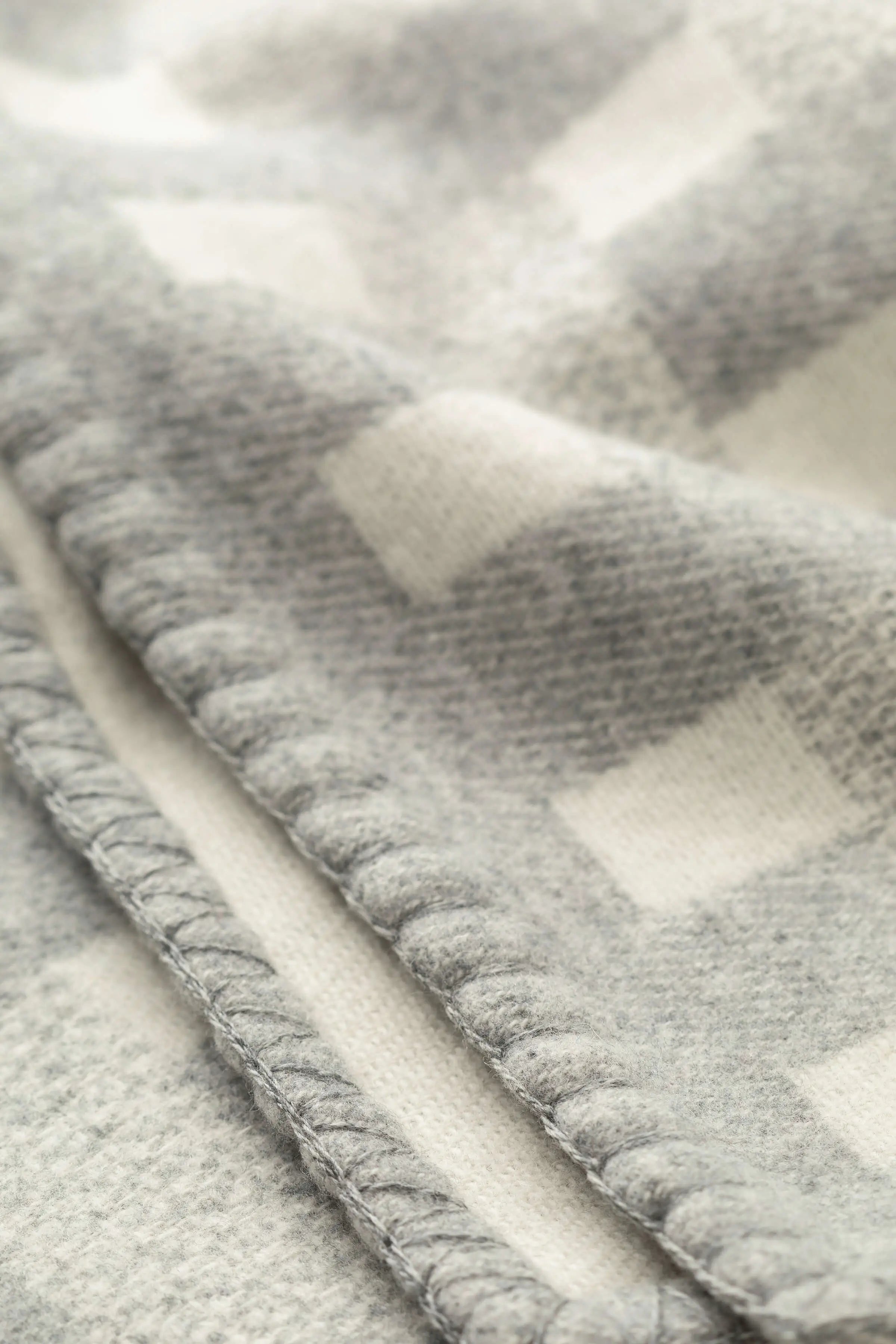 Johnstons of Elgin - Blanket Stitched Basketweave Throw in Light Grey