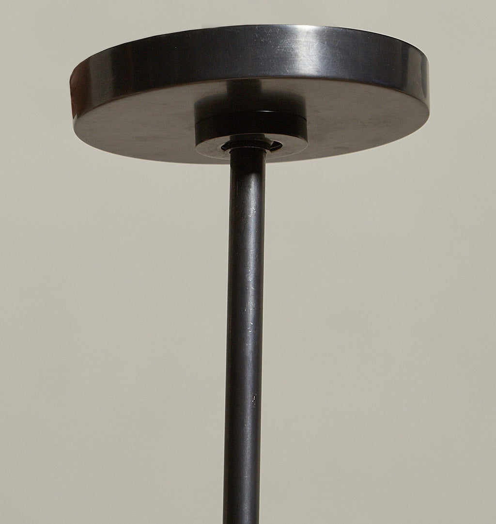 Amber Interiors - Cyrus 19" Pendant in Bronze / White Glass Floor Model