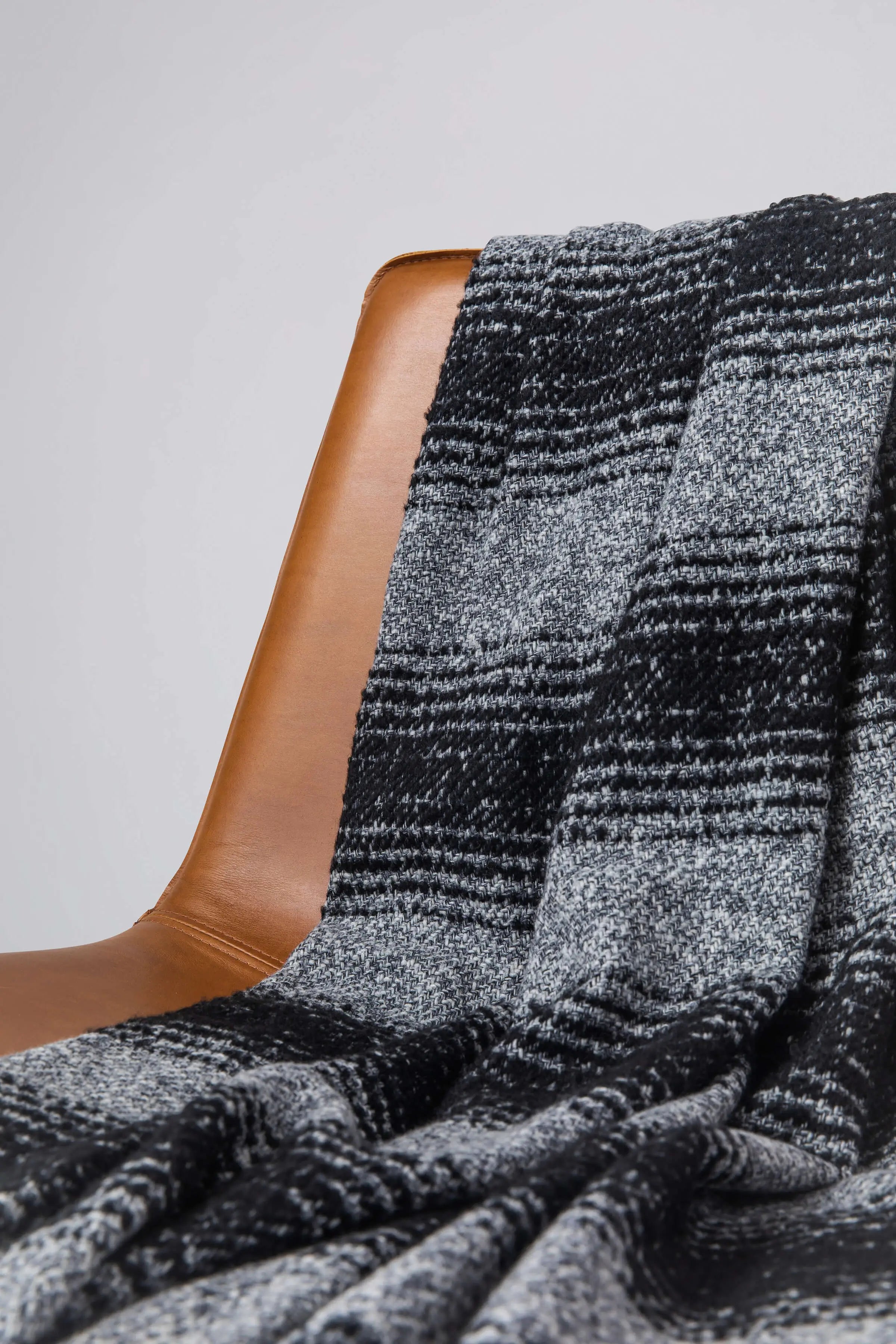 Johnstons of Elgin - Textural Ombré Dark Grey Throw