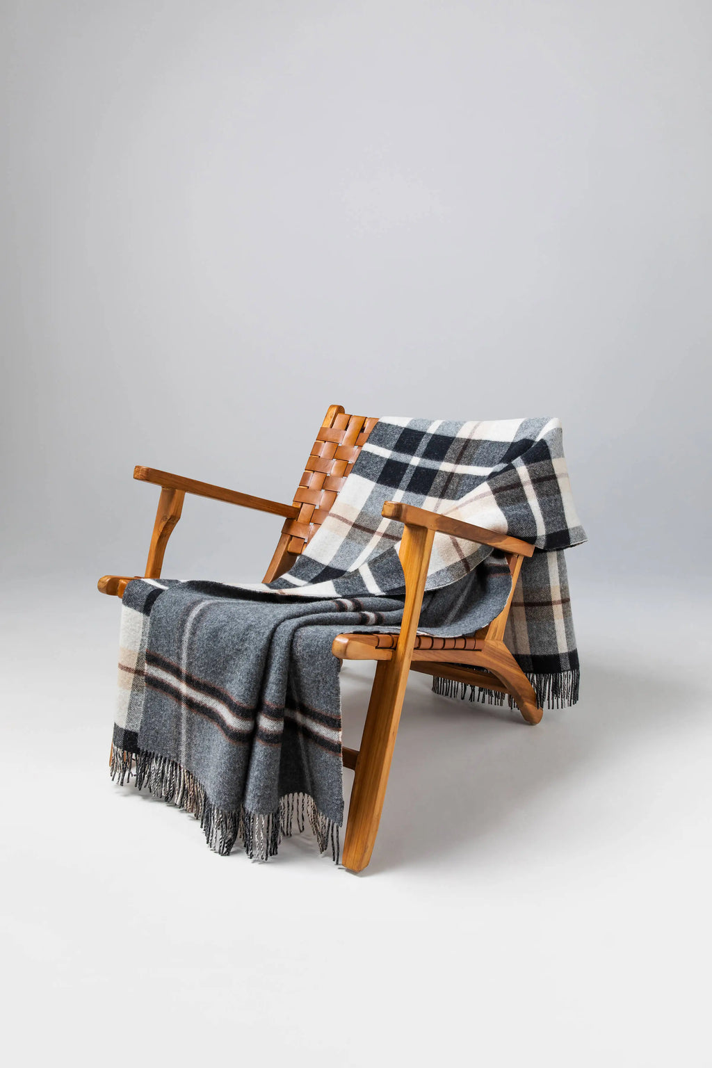 Johnstons of Elgin - Double Face Lambswool Throw in Black & Brown Plaid