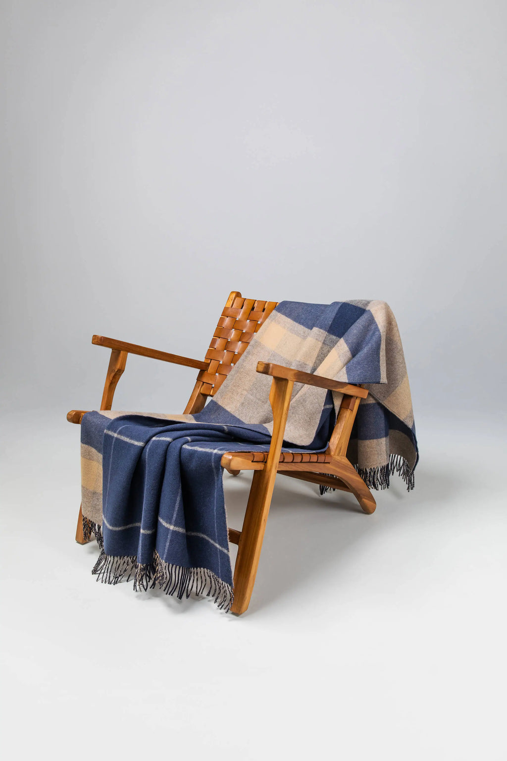 Johnstons of Elgin - Double Face Lambswool Throw in Brown & navy Overcheck