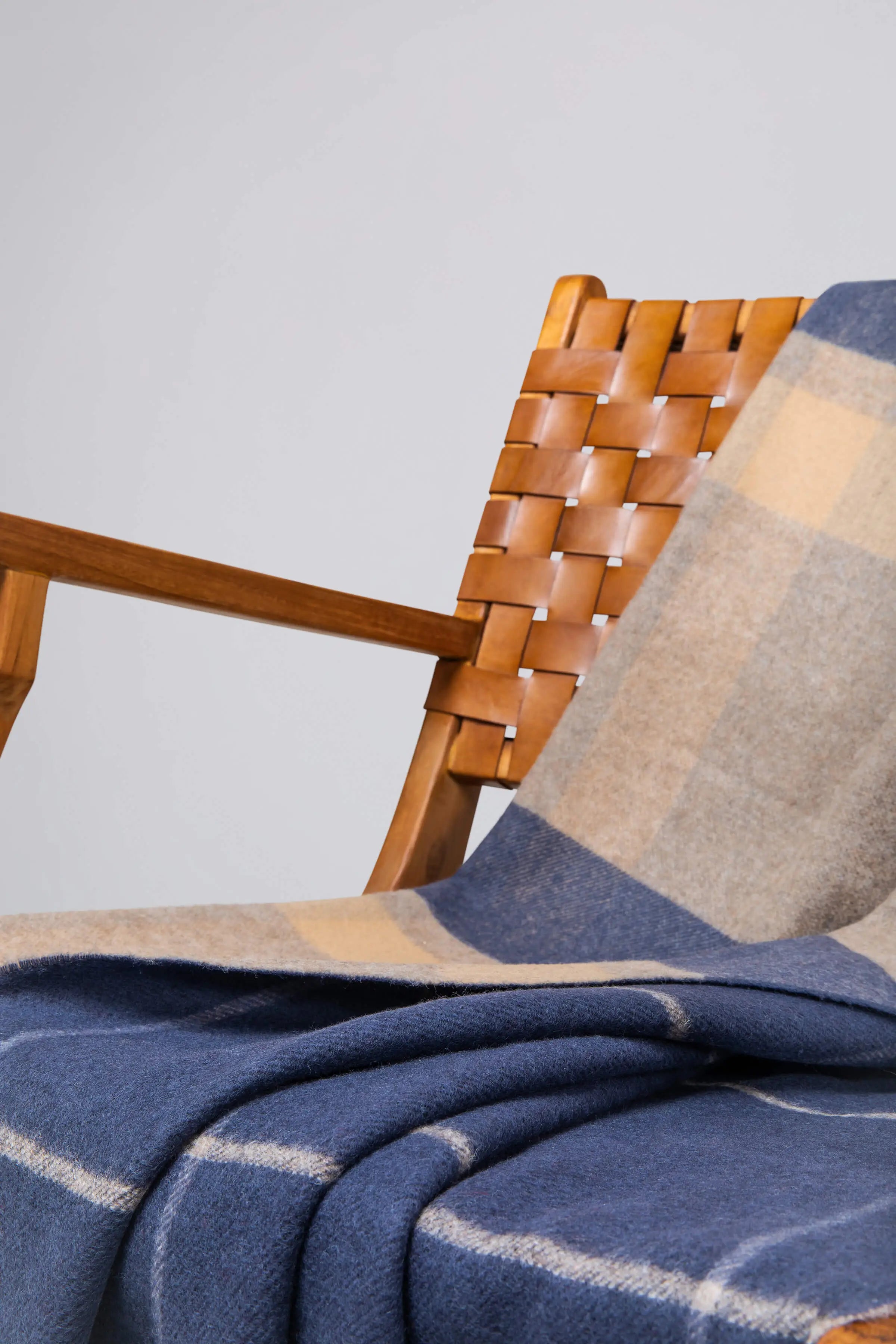 Johnstons of Elgin - Double Face Lambswool Throw in Brown & navy Overcheck