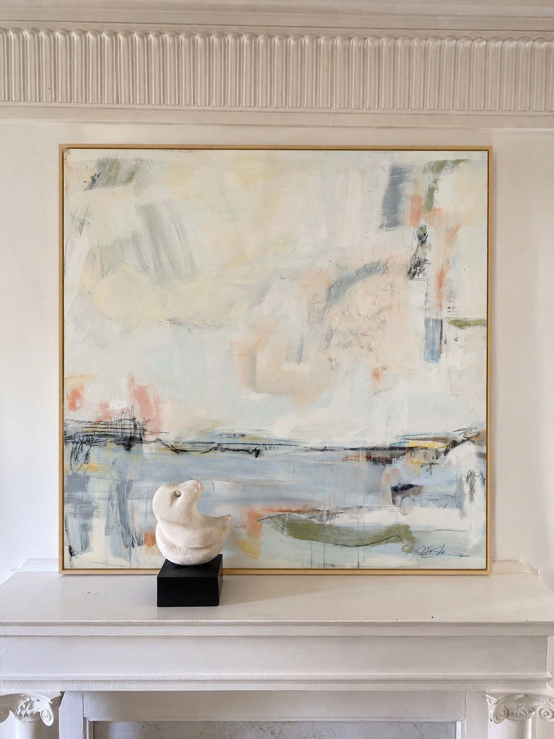 Blue Blush above a white mantel with a small bird sculpture